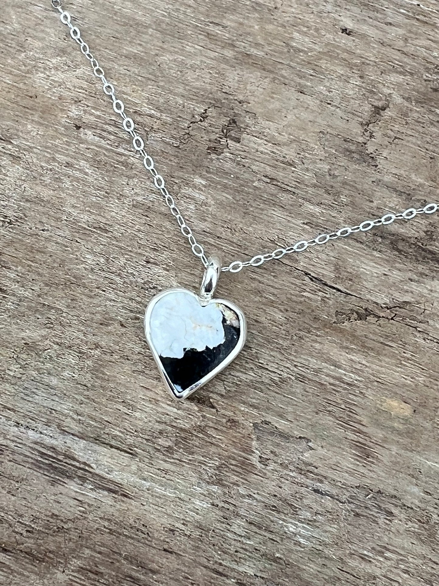 White Buffalo heart charm